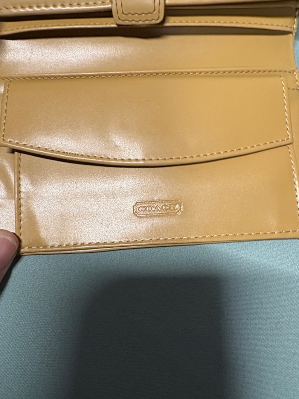 Coach Soho Signature Canvas Buckle Trifold Wallet | Khaki & Tan Leather - Picture 2 of 9
